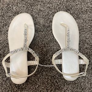 Brand new, never worn size 7 wide sandals